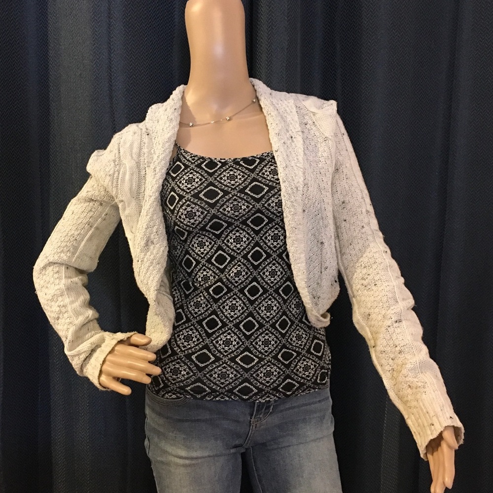 Knit cardigan. Cream w/cable knit detail